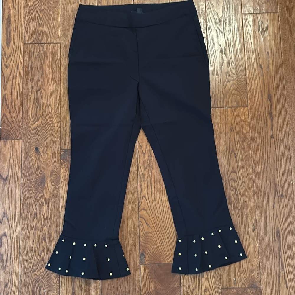 Black Ruffle Hem Crop Pants with Gold Studs. Perfect for spring!
